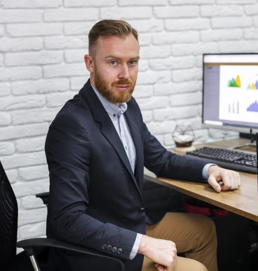 handsome-man-sitting-desk